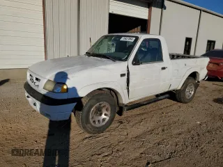 2001 Mazda B-Series 2WD Truck DS with VIN 4F4YR12U41TM25842, listed as a Copart auction lot 76827864 with 252,323 mi miles and Salvage Title. Bid and sale history available at carsss.com. Image 1.