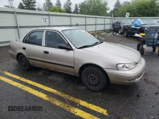 1999 Chevrolet Prizm z VIN 1Y1SK5284XZ403676, wystawiony jako Copart lot #57961725 z przebiegiem Nie podano mil oraz Szkody całkowita. Historia ofert i sprzedaży dostępna na DreamBid. Obrazek 4.