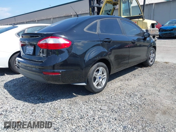2018 Ford Fiesta SE with VIN 3FADP4BJ7JM115872, listed as a IAAI auction lot 41969970 with 156,537 mi miles. Bid and sale history available at carsss.com. Image 4.