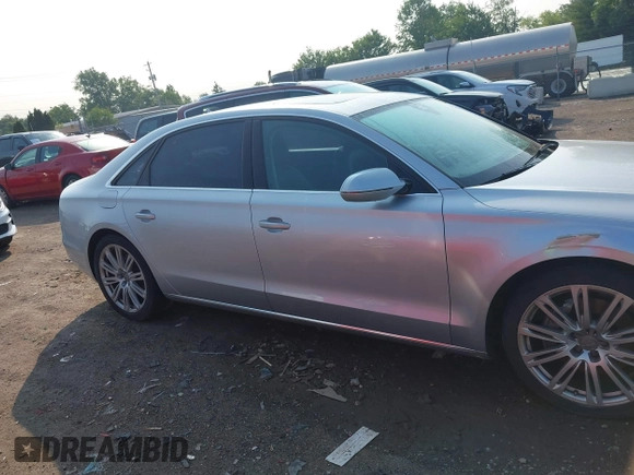 2013 Audi A8 3.0L с VIN WAURGAFD7DN016351, выставлен на аукционе IAAI как лот 42372202 с пробегом 90 753 миль миль и . История ставок и продаж доступна на DreamBid. Изображение 13.