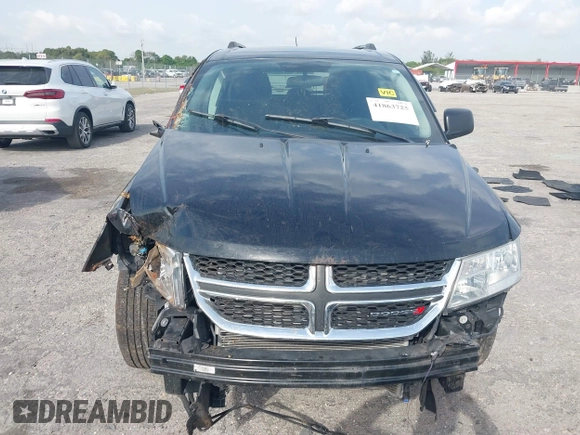 2017 Dodge Journey SE with VIN 3C4PDCAB4HT691343, listed as a IAAI auction lot 41863725 with 99,519 mi miles and . Bid and sale history available at carsss.com. Image 12.