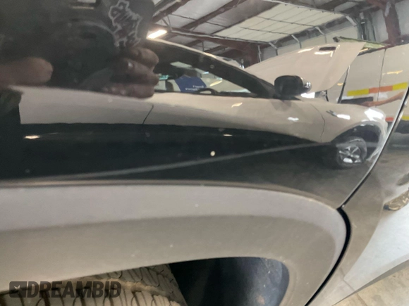 2022 Chevrolet Traverse LT with VIN 1GNERHKW8NJ150023, listed as a IAAI auction lot 42585752 with 102,823 mi miles and . Bid and sale history available at DreamBid. Image 7.