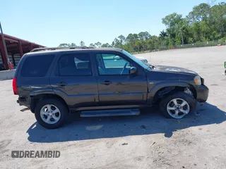 2006 Mazda Tribute i with VIN 4F2YZ02Z36KM29148, listed as a IAAI auction lot 42044163 with 175,786 mi miles and . Bid and sale history available at carsss.com. Image 13.