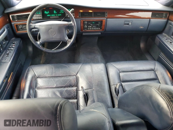 1994 Cadillac Concours z VIN 1G6KF52Y3RU231877, wystawiony jako Copart lot #82150174 z przebiegiem 76 279 mil mil oraz Szkody całkowita. Historia ofert i sprzedaży dostępna na DreamBid. Obrazek 8.