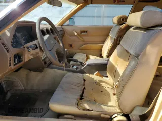 1982 Datsun 280ZX 2+2 z VIN JN1HZ06S8CX428785, wystawiony jako Copart lot #80942274 z przebiegiem 88 574 mil mil oraz Tytuł czysty. Historia ofert i sprzedaży dostępna na DreamBid. Obrazek 7.