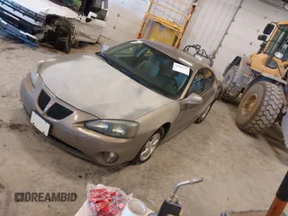2007 Pontiac Grand Prix with VIN 2G2WP552671116867, listed as a IAAI auction lot 41988243 with 167,173 mi miles. Bid and sale history available at carsss.com. Image 2.