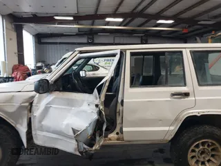 1997 Jeep Cherokee SE with VIN 1J4FJ28S1VL528218, listed as a IAAI auction lot 41931137 with 210,196 mi miles. Bid and sale history available at carsss.com. Image 13.