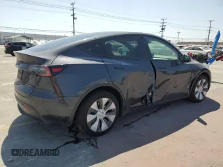 2024 Tesla Model Y Long Range z VIN 7SAYGDEE0RF062395, wystawiony jako Copart lot #55071185 z przebiegiem 42 747 mil mil oraz Szkoda całkowita • Salvage title. Historia ofert i sprzedaży dostępna na DreamBid. Obrazek 3.