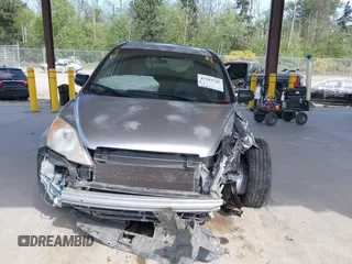 2007 Honda CR-V EX z VIN JHLRE48587C101668, wystawiony jako IAAI lot #42183745 z przebiegiem 173 469 mil mil oraz . Historia ofert i sprzedaży dostępna na DreamBid. Obrazek 13.