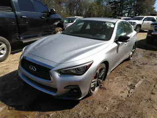 2020 Infiniti Q50 Red Sport 400 with VIN JN1FV7AP2LM630098, listed as a IAAI auction lot 41828404 with 33,962 mi miles and . Bid and sale history available at DreamBid. Image 2.