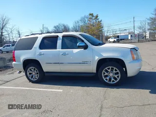 2009 GMC Yukon SLT 4SB with VIN 1GKFK33079R251967, listed as a IAAI auction lot 41901508 with 186,900 mi miles and . Bid and sale history available at DreamBid. Image 13.