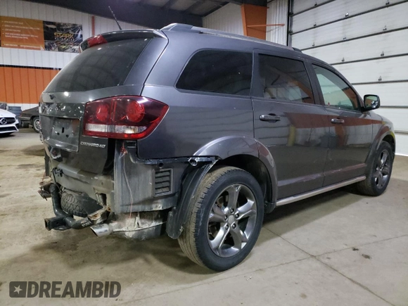 2015 Dodge Journey Crossroad z VIN 3C4PDDGGXFT519212, wystawiony jako Copart lot #46250663 z przebiegiem 128 417 mil mil oraz Szkoda całkowita • Salvage title. Historia ofert i sprzedaży dostępna na DreamBid. Obrazek 3.