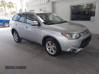 2015 Mitsubishi Outlander SE with VIN JA4AZ3A39FZ010819, listed as a IAAI auction lot 42402604 with 86,374 mi miles and . Bid and sale history available at DreamBid. Image 1.