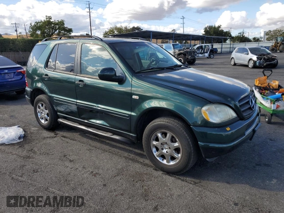 2000 Mercedes-Benz M-Class with VIN 4JGAB54E1YA194220, listed as a Copart auction lot 78433324 with 125,405 mi miles and Salvage Title. Bid and sale history available at carsss.com. Image 4.