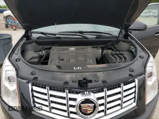 2014 Cadillac SRX Luxury Collection z VIN 3GYFNEE33ES639155, wystawiony jako Copart lot #58591935 z przebiegiem 76 368 mil mil oraz Szkoda całkowita • Salvage title. Historia ofert i sprzedaży dostępna na DreamBid. Obrazek 11.