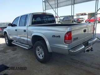 2002 Dodge Dakota SLT with VIN 1B7HG48N62S546119, listed as a IAAI auction lot 41826998 with 157,761 mi miles. Bid and sale history available at carsss.com. Image 3.