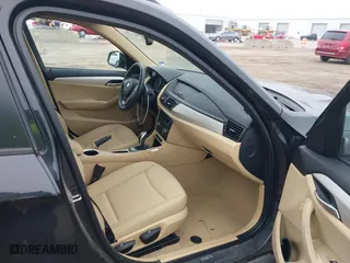 2014 BMW X1 sDrive28i with VIN WBAVM1C58EVW48622, listed as a IAAI auction lot 41531855 with 90,102 mi miles. Bid and sale history available at carsss.com. Image 5.
