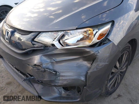 2015 Honda Fit LX with VIN 3HGGK5H5XFM719477, listed as a IAAI auction lot 41671194 with 145,876 mi miles. Bid and sale history available at carsss.com. Image 6.