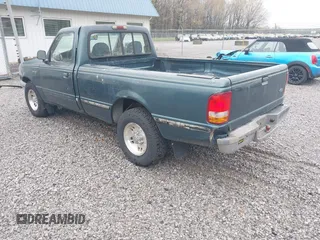 1995 Ford Ranger XLT with VIN 1FTCR10X9STA67218, listed as a IAAI auction lot 41952953 with 230,733 mi miles. Bid and sale history available at carsss.com. Image 3.
