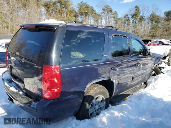 2009 GMC Yukon SLT w/4SB with VIN 1GKFK33059R146280, listed as a Copart auction lot 87421444 with 118,566 mi miles and Salvage Title. Bid and sale history available at carsss.com. Image 3.