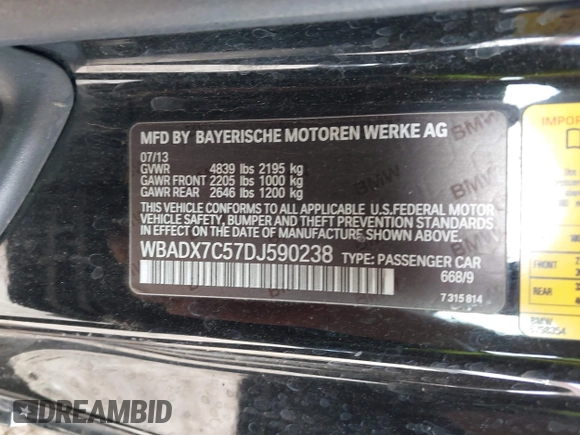 2013 BMW 3 Series 335i with VIN WBADX7C57DJ590238, listed as a IAAI auction lot 41920557 with 160,946 mi miles and . Bid and sale history available at DreamBid. Image 9.