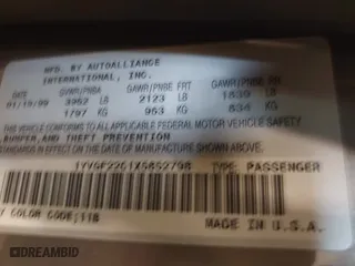 1999 Mazda 626 ES with VIN 1YVGF22C1X5852798, listed as a IAAI auction lot 41736489 with 136,536 mi miles. Bid and sale history available at carsss.com. Image 9.