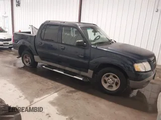 2003 Ford Explorer Sport Trac XLS z VIN 1FMZU67E93UA65275, wystawiony jako IAAI lot #41496493 z przebiegiem 220 872 mil mil oraz . Historia ofert i sprzedaży dostępna na DreamBid. Obrazek 1.