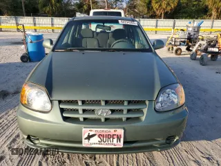 2005 Hyundai Accent GLS with VIN KMHCG45C35U595666, listed as a Copart auction lot 88294365 with 70,497 mi miles and Salvage Title. Bid and sale history available at carsss.com. Image 5.