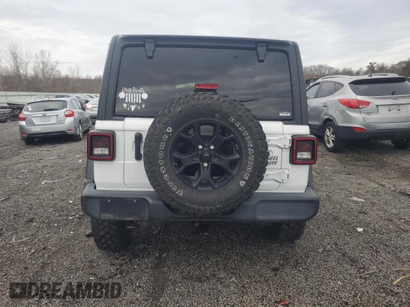 2021 Jeep Wrangler Unlimited Willys with VIN 1C4HJXDN9MW509795, listed as a Copart auction lot 51667375 with 53,473 mi miles and Salvage Title. Bid and sale history available at DreamBid. Image 6.