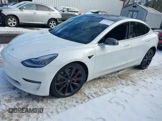 2020 Tesla Model 3 Performance z VIN 5YJ3E1EC5LF791879, wystawiony jako IAAI lot #41302692 z przebiegiem 76 502 mil mil oraz . Historia ofert i sprzedaży dostępna na DreamBid. Obrazek 2.