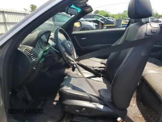 2011 BMW 1 Series 128i with VIN WBAUN1C52BVH82744, listed as a Copart auction lot 63441125 with 129,245 mi miles and Salvage title. Bid and sale history available at DreamBid. Image 7.