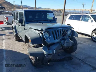 2014 Jeep Wrangler Unlimited Rubicon X with VIN 1C4BJWFG3EL134522, listed as a IAAI auction lot 41221381 with 66,897 mi miles and . Bid and sale history available at DreamBid. Image 1.
