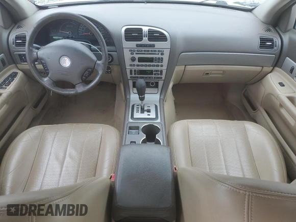 2005 Lincoln LS Sport z VIN 1LNHM87A05Y667868, wystawiony jako Copart lot #73318074 z przebiegiem 114 623 mil mil oraz Szkoda całkowita • Salvage title. Historia ofert i sprzedaży dostępna na DreamBid. Obrazek 8.