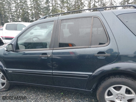 2002 Mercedes-Benz M-Class with VIN 4JGAB54E72A296354, listed as a IAAI auction lot 41277897 with 101,842 mi miles. Bid and sale history available at carsss.com. Image 14.