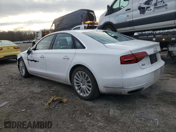 2015 Audi A8 z VIN WAUJGAFD9FN003570, wystawiony jako Copart lot #87642905 z przebiegiem 71 523 mil mil oraz Czysty tytuł • Clean title. Historia ofert i sprzedaży dostępna na DreamBid. Obrazek 2.