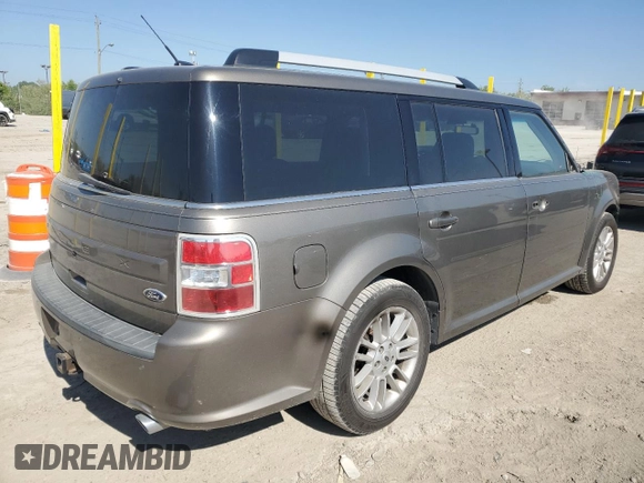 2014 Ford Flex SEL z VIN 2FMGK5C8XEBD43259, wystawiony jako Copart lot #56129285 z przebiegiem 142 203 mil mil oraz Szkoda całkowita • Salvage title. Historia ofert i sprzedaży dostępna na DreamBid. Obrazek 3.