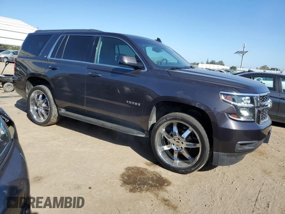 2015 Chevrolet Tahoe LT z VIN 1GNSKBKC6FR612639, wystawiony jako Copart lot #55512645 z przebiegiem 211 510 mil mil oraz Czysty tytuł • Clean title. Historia ofert i sprzedaży dostępna na DreamBid. Obrazek 4.