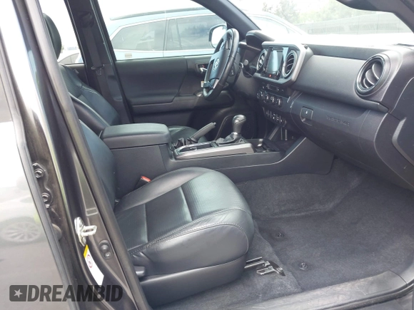 2019 Toyota Tacoma SR with VIN 3TMCZ5AN3KM207783, listed as a IAAI auction lot 42375280 with 55,784 mi miles and . Bid and sale history available at DreamBid. Image 5.