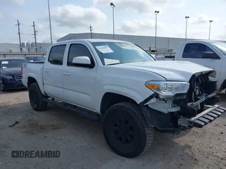 2023 Toyota Tacoma SR with VIN 3TYCZ5ANXPT158660, listed as a IAAI auction lot 42298915 with 26,771 mi miles and . Bid and sale history available at DreamBid. Image 1.