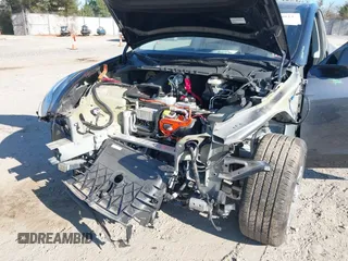 2024 Tesla Model Y with VIN 7SAYGDED3RF092501, listed as a IAAI auction lot 40820923 with 4,688 mi miles and . Bid and sale history available at DreamBid. Image 6.