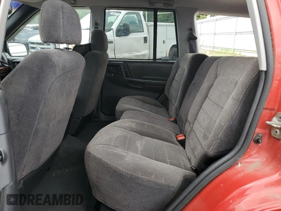 1997 Jeep Grand Cherokee Laredo with VIN 1J4GZ58S8VC601342, listed as a Copart auction lot 65360204 with 139,036 mi miles and Salvage Title. Bid and sale history available at carsss.com. Image 11.