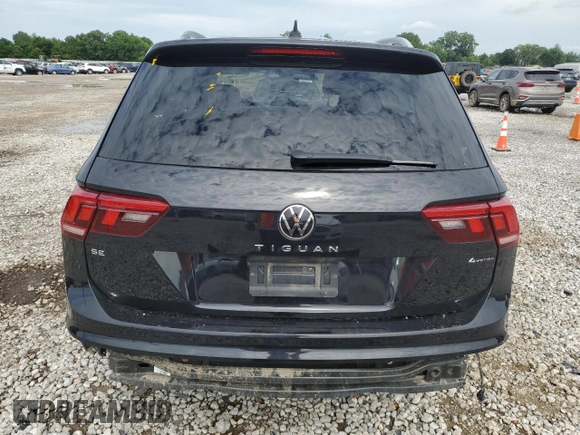 2022 Volkswagen Tiguan SE с VIN 3VV2B7AX3NM075952, выставлен на аукционе Copart как лот 63391225 с пробегом 64 687 миль миль и Списание • Salvage title. История ставок и продаж доступна на DreamBid. Изображение 6.