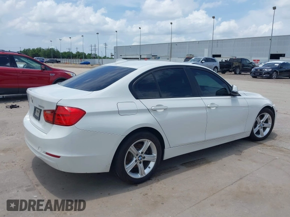 2013 BMW 3 Series 320i with VIN WBA3B1C50DK129576, listed as a IAAI auction lot 42393038 with 160,370 mi miles and . Bid and sale history available at DreamBid. Image 4.
