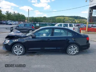 2015 Volkswagen Jetta Sedan 1.8T SE w/Connectivity with VIN 3VWD07AJ2FM255186, listed as a IAAI auction lot 35986577 with 7,853 mi miles. Bid and sale history available at carsss.com. Image 14.