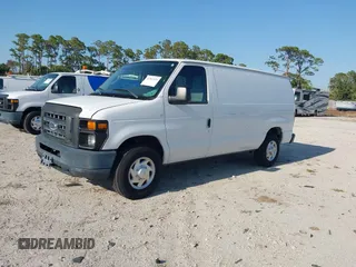 2012 Ford Econoline Cargo Commercial with VIN 1FTNE2EL1CDB15063, listed as a IAAI auction lot 41861426 with 167,961 mi miles and . Bid and sale history available at DreamBid. Image 2.
