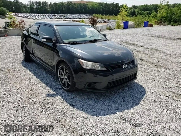2012 Scion tC z VIN JTKJF5C72C3044845, wystawiony jako Copart lot #57863765 z przebiegiem 220 967 mil mil oraz Szkoda całkowita • Salvage title. Historia ofert i sprzedaży dostępna na DreamBid. Obrazek 13.