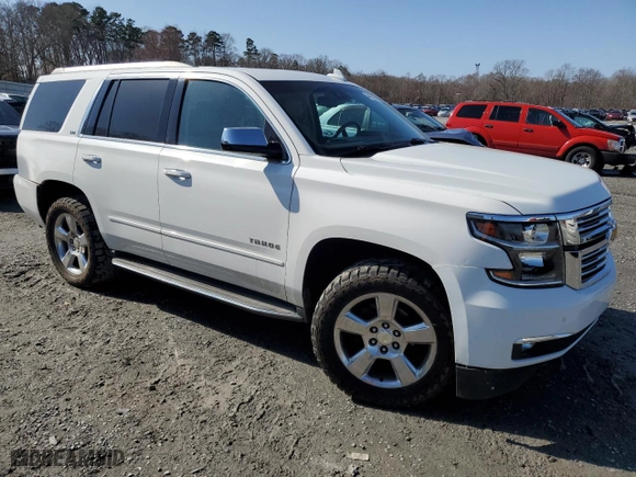 2015 Chevrolet Tahoe LTZ with VIN 1GNSKCKC9FR666040, listed as a Copart auction lot 44431875 with 233,166 mi miles and Salvage Title. Bid and sale history available at carsss.com. Image 4.
