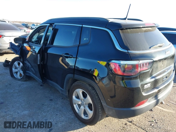 2019 Jeep Compass Latitude with VIN 3C4NJCBB1KT851846, listed as a IAAI auction lot 41219621 with 56,626 mi miles and . Bid and sale history available at DreamBid. Image 3.
