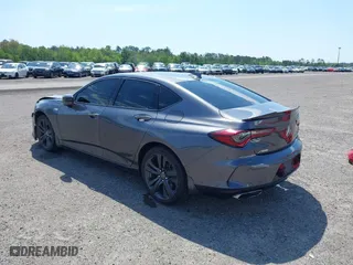 2022 Acura TLX w/A-Spec Package with VIN 19UUB5F55NA002177, listed as a IAAI auction lot 41208723 with 58,795 mi miles. Bid and sale history available at carsss.com. Image 3.