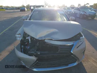 2016 Lexus ES 300h z VIN JTHBW1GG4G2106710, wystawiony jako IAAI lot #41684479 z przebiegiem 144 559 mil mil oraz . Historia ofert i sprzedaży dostępna na DreamBid. Obrazek 6.